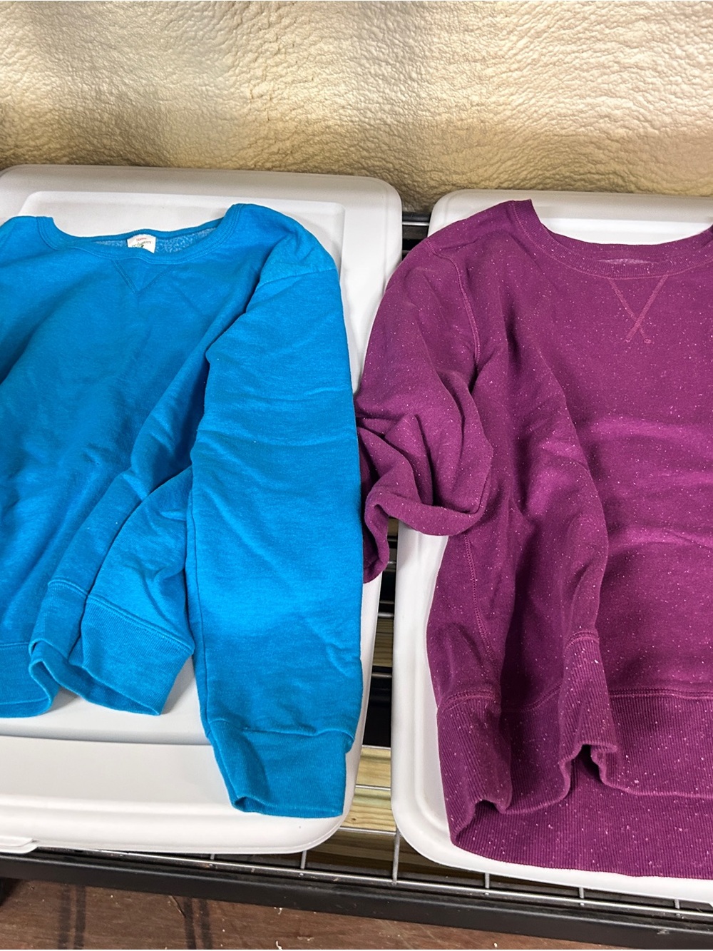 Two womens sweatshirts(blue and purple)